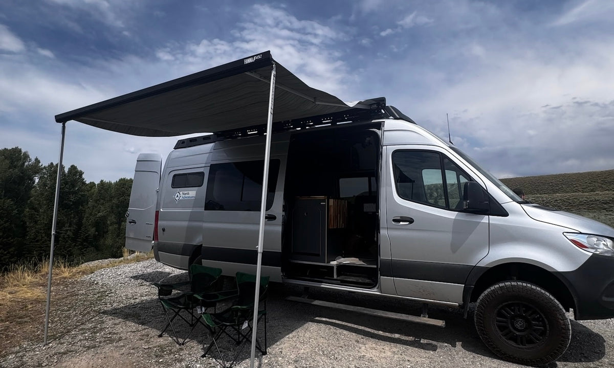  and cozy seating.|Explore this stylish rv rental interior featuring a comfy bed
