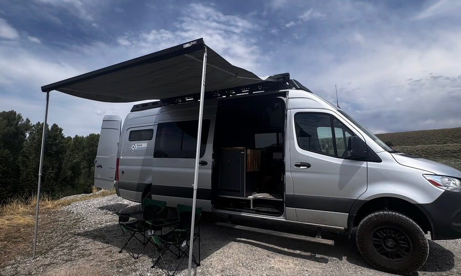  and cozy seating.|Explore this stylish rv rental interior featuring a comfy bed