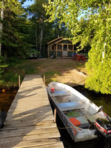 Waterfront cabin with private dock & boat. Imagine parking your **rv rental** here for a tranquil escape!