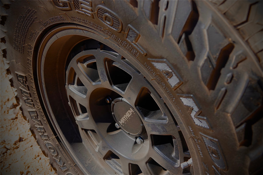 Rugged off-road tire and Mayhem custom wheel, ideal for a memorable RV rental adventure.