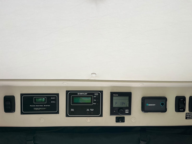  ideal for road trips.|Rear of a grey Winnebago Travato rv rental. Features a ladder — photo 19
