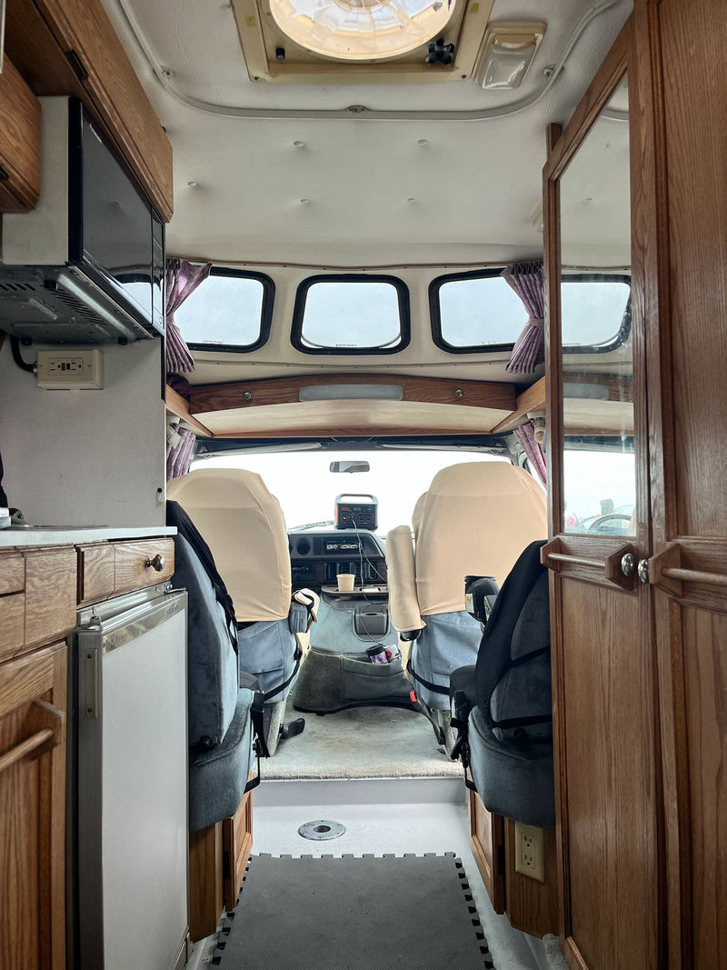  featuring dual gray bench seats with wooden bases — photo 9