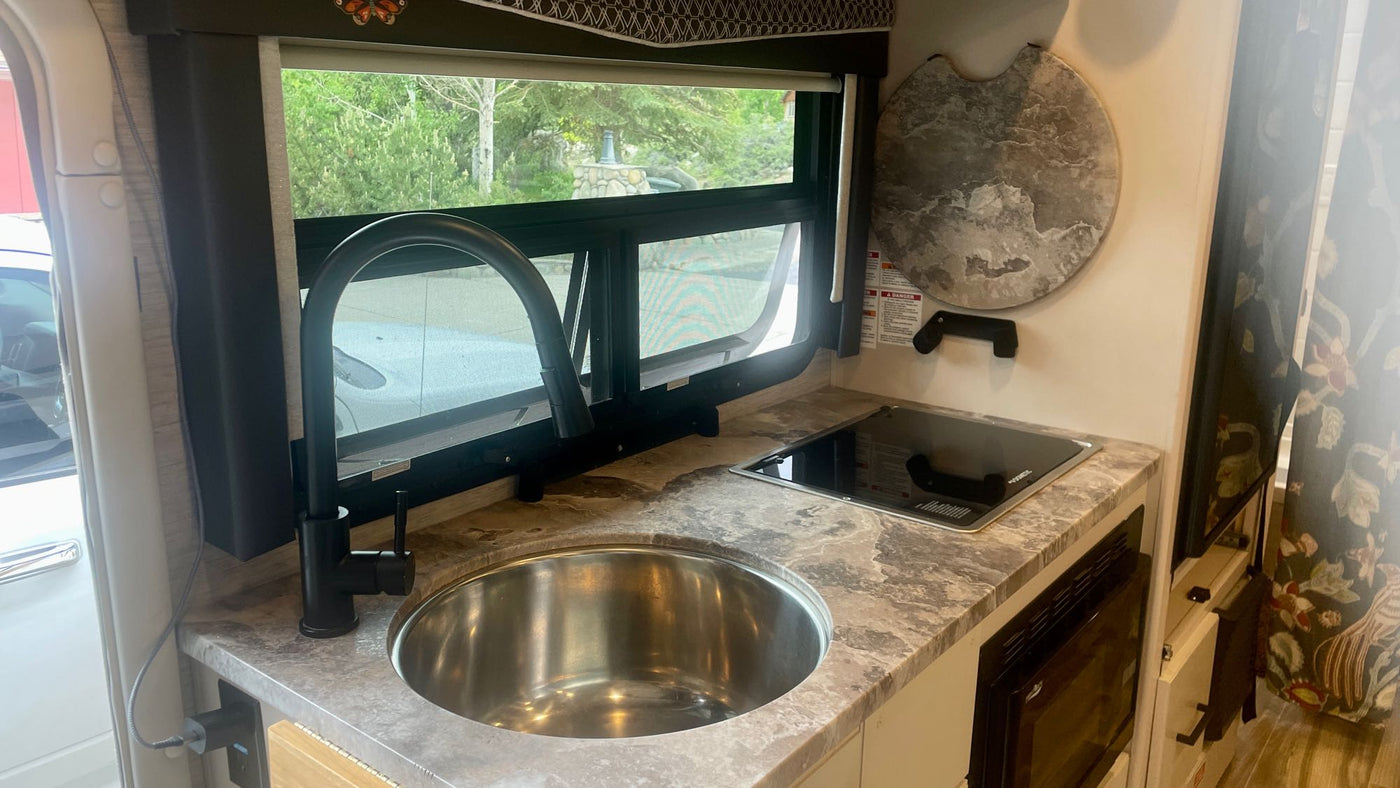  and compact bath.|Beige RV rental — photo 5