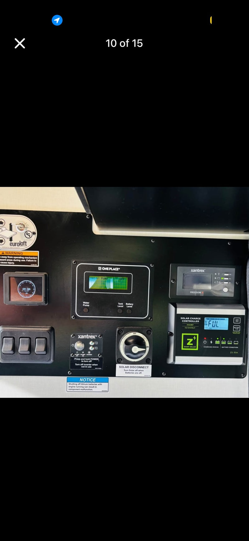 RV rental control panel: Xantrex inverter, Zamp solar, water, tank, & battery levels. Essential for managing power and resources. — photo 10
