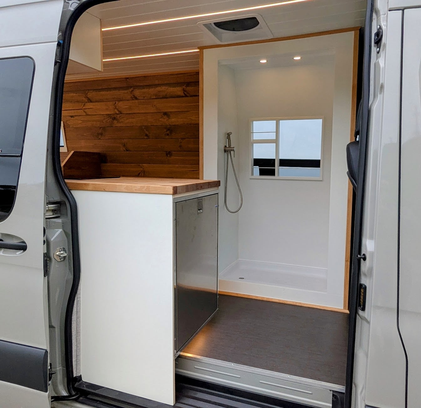  all boasting an incredible ocean view.|Explore in comfort with this rv rental! Features a custom wood kitchen — photo 3