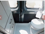 Explore this RV rental's compact wet bath: toilet, shower pan, and sleek cabinets. Rear doors open for ventilation.