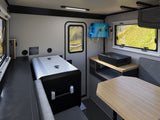 This compact rv rental interior offers a fridge, stove, portable shower, and dining area, ready for adventure in scenic landscapes.