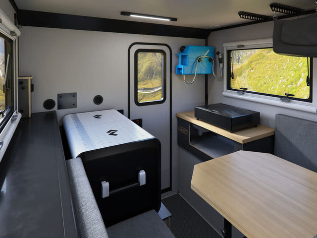  and two bikes on the front rack. Perfect for outdoor adventures!|This compact rv rental interior offers a fridge