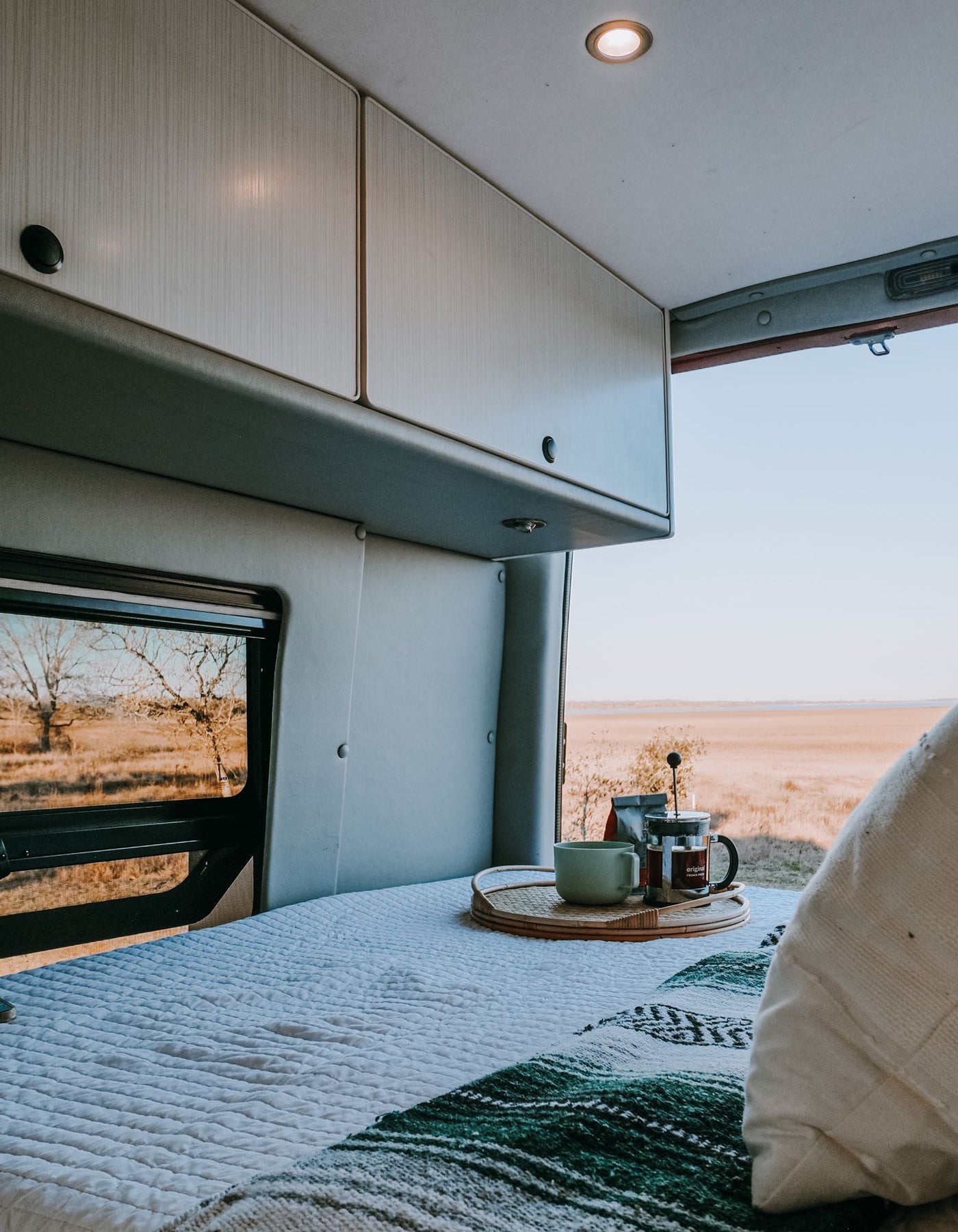  and scenic field views.|Cozy RV rental dinette with serene nature views — photo 11