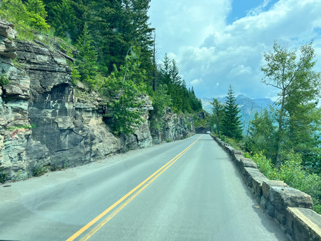 Enjoy a mountain scenic drive with your RV rental. Steep cliffs, lush trees, and distant peaks define this natural road.