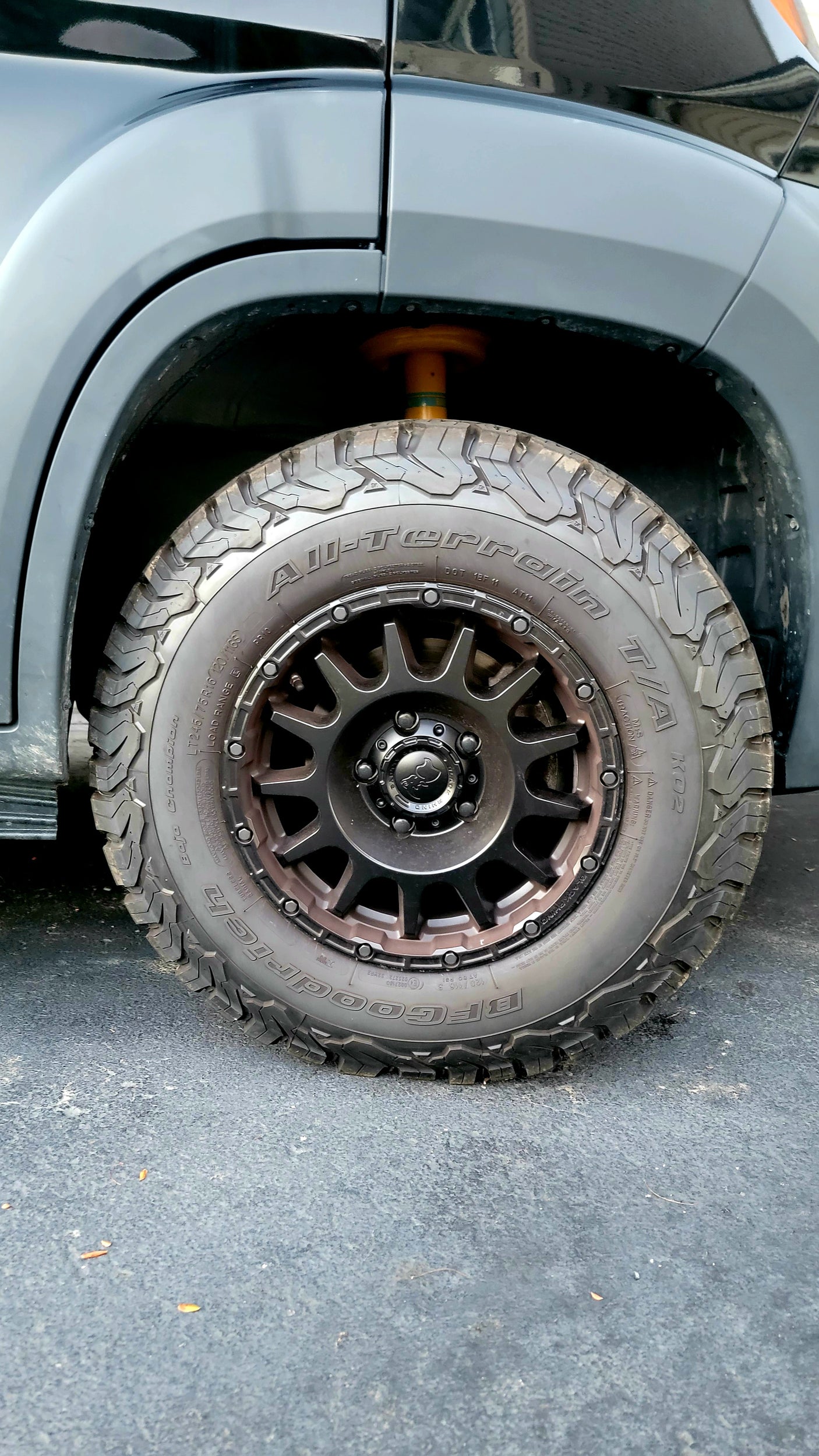 Detailed shot of a BFGoodrich All-Terrain T/A KO2 tire and Black Rhino wheel on a vehicle, ideal for an rv rental adventure.