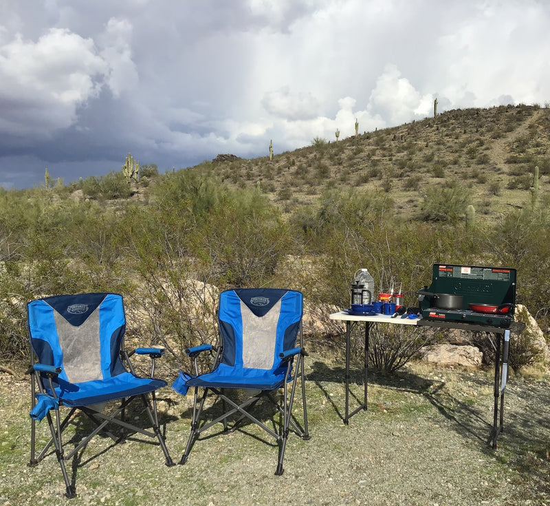  during desert camping. A distant RV rental promises more outdoor travel fun.|An SUV adapted for car camping is parked in a sunny — photo 4