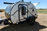 This Freesolo compact camper trailer, ideal for RV rental, features an off-road design, front window & roof rack.