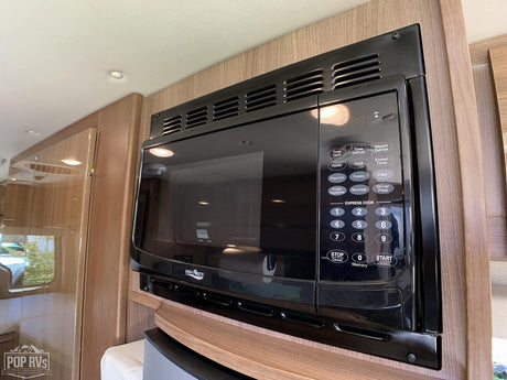 High Pointe microwave oven in an RV kitchen, a key amenity for any rv rental.