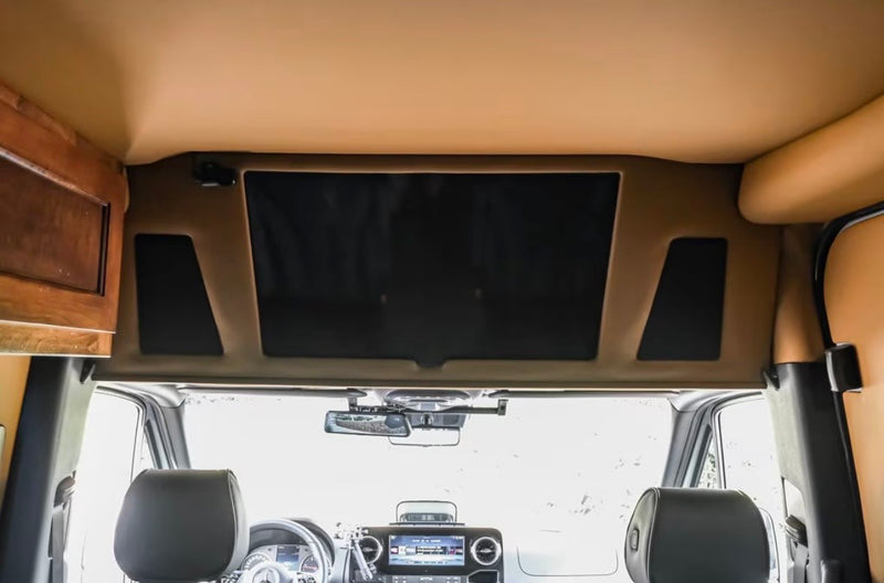  and practical storage.|Experience luxury in this RV rental! Plush black captain's chairs — photo 4