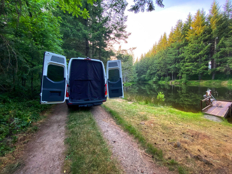  parked on a dirt forest path at sunset — photo 3