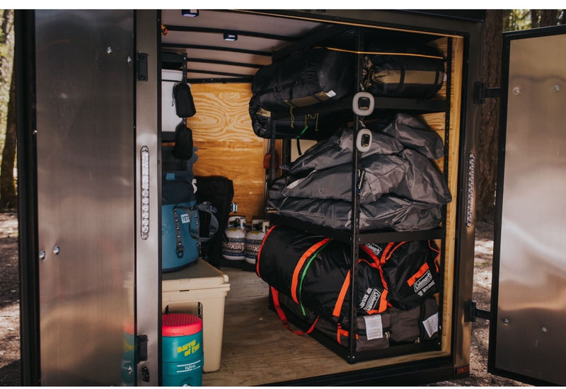  packed with gear like Yeti coolers & Coleman sleeping bags — photo 1