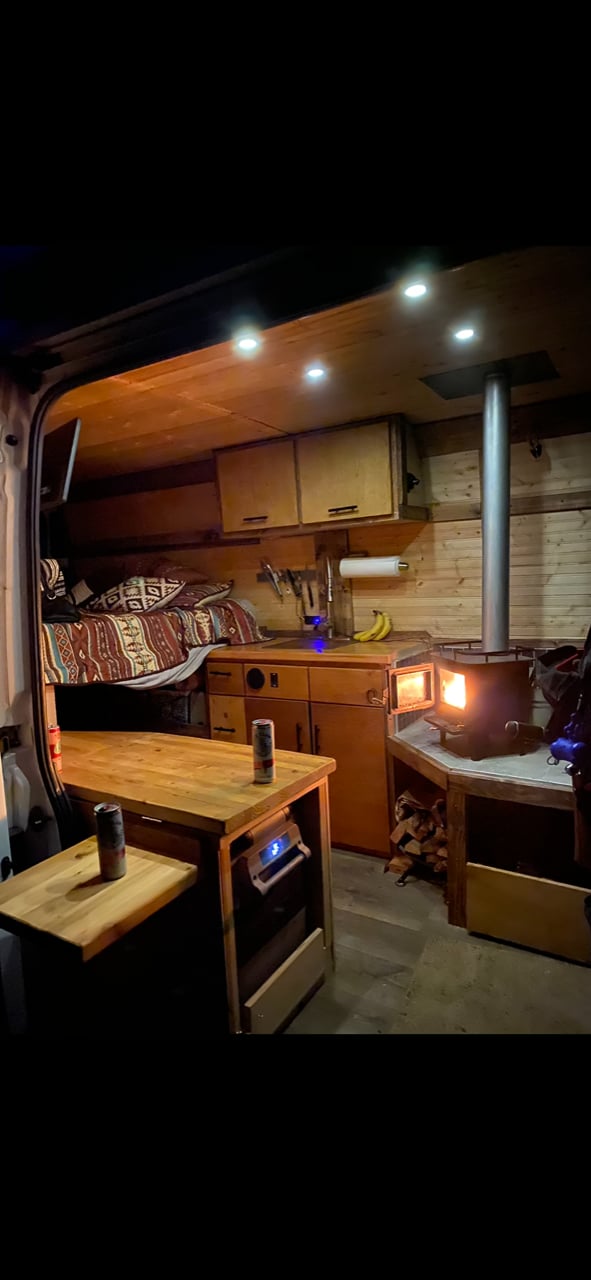 Inside a cozy RV rental van — photo 1