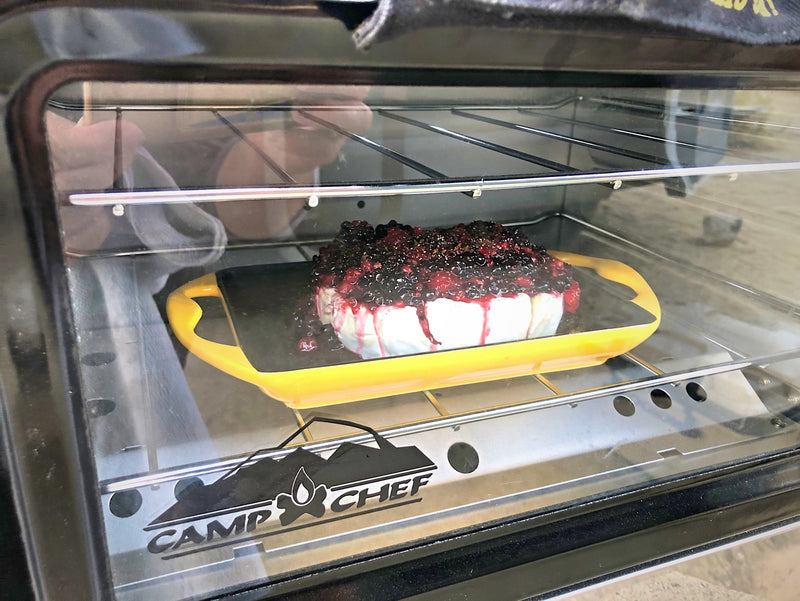 Baked brie with berries in a Camp Chef portable oven, ideal for RV rental cooking. — photo 8