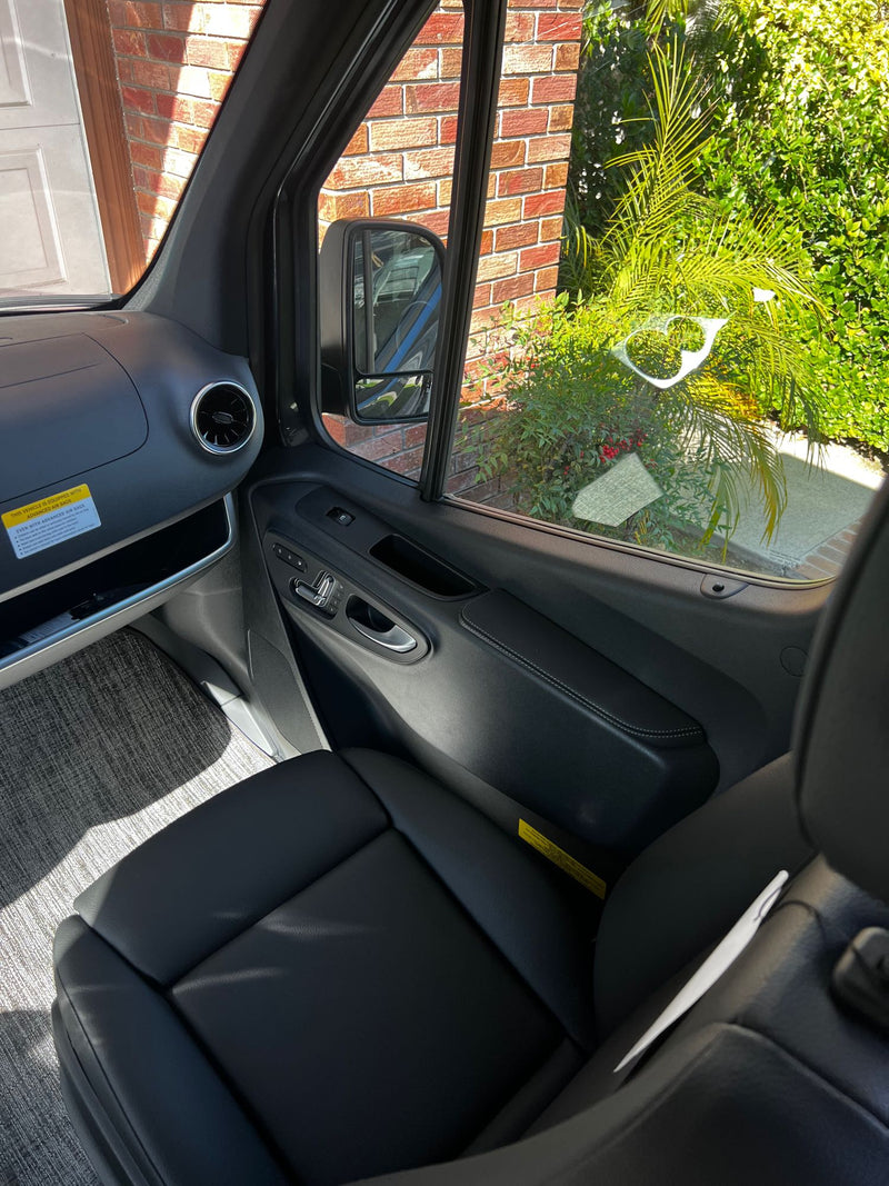  and a 'Tranquility' decal.|Dark gray Mercedes-Benz Sprinter camper van — photo 6