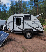 This FreeSolo teardrop camper trailer is an ideal RV rental for off-grid camping, with portable solar panels.