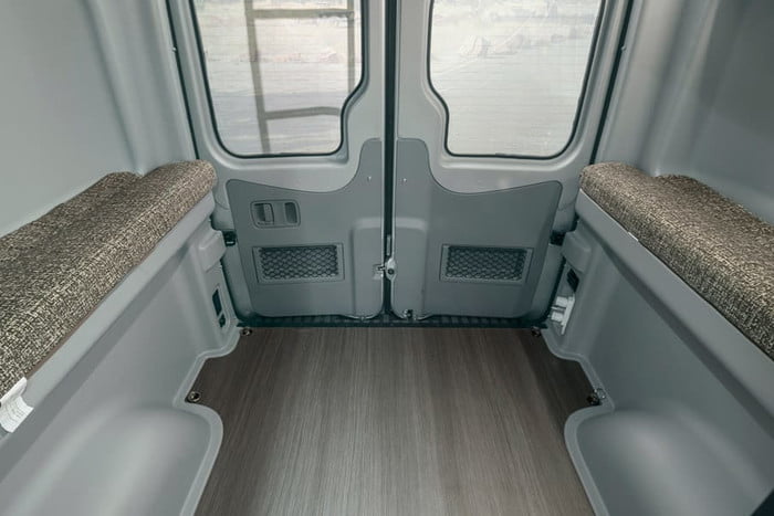  ready for winter adventures in the snowy forest.|Compact RV rental kitchen with a covered sink — photo 20