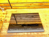Compact Empara induction cooktop with two burners set in a wood countertop, ideal for an RV rental kitchen experience.