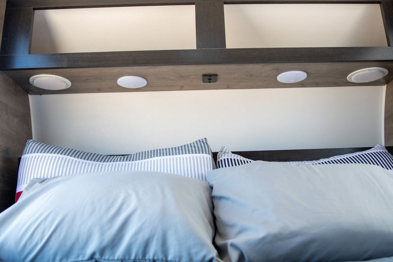  ready for your RV rental adventure!|An RV rental: a grey teardrop trailer with an extended awning — photo 18