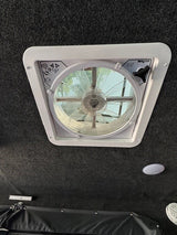 This photo shows a MAX FAN ceiling vent in an RV rental, providing airflow for a comfy journey.