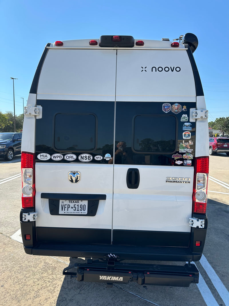 White noovo RV rental camper van (Ram ProMaster) with travel stickers & Texas license plate VFP-5190 on its rear. — photo 10