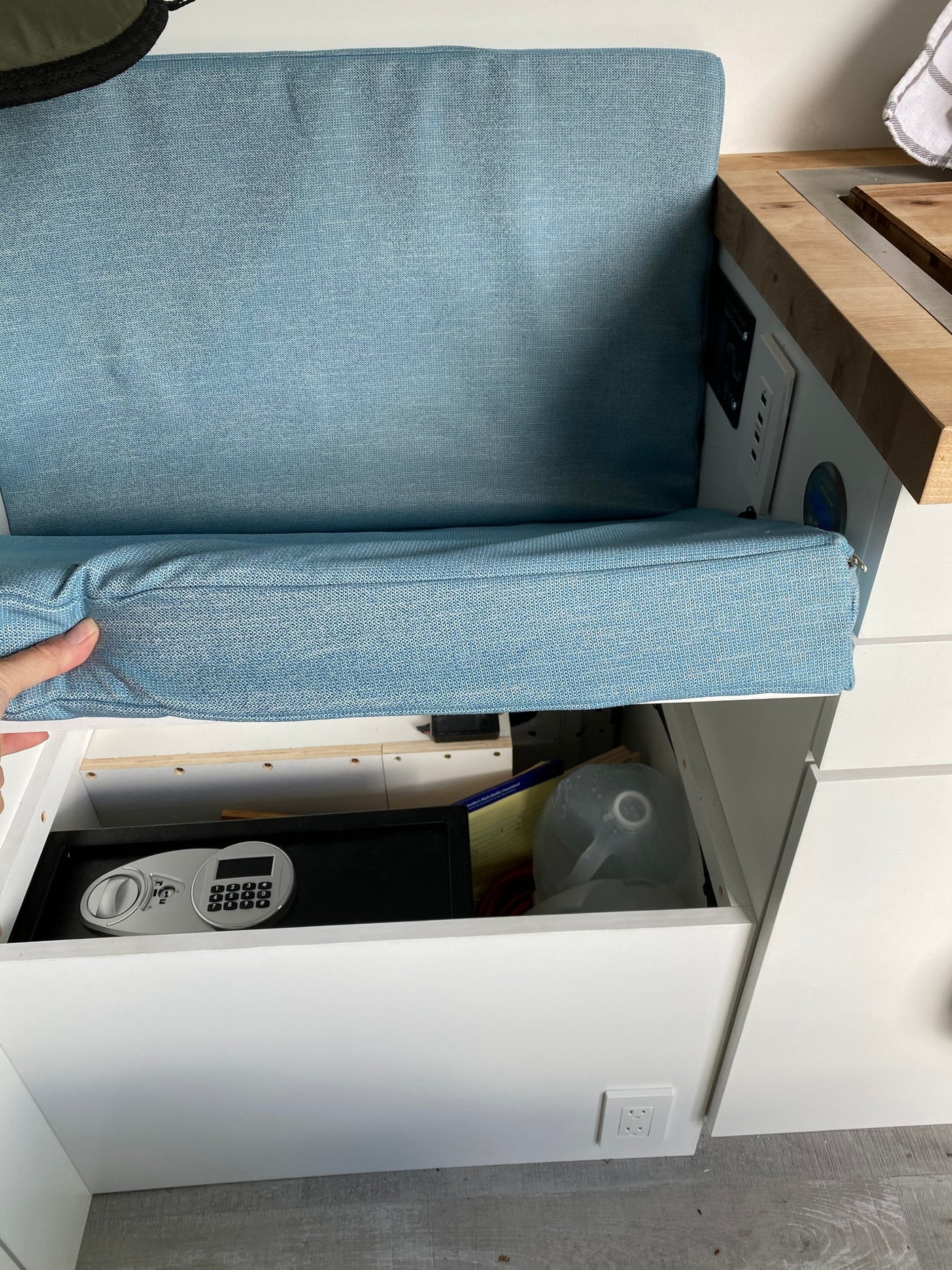  with storage visible.|Inside an RV rental: Compact kitchenette with induction cooktop — photo 13