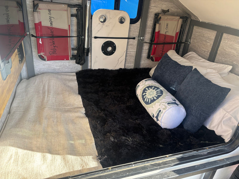  is perfect for your next RV rental.|This mobile RV rental features an overland trailer with a deployed roof-top tent and a large side privacy room — photo 3