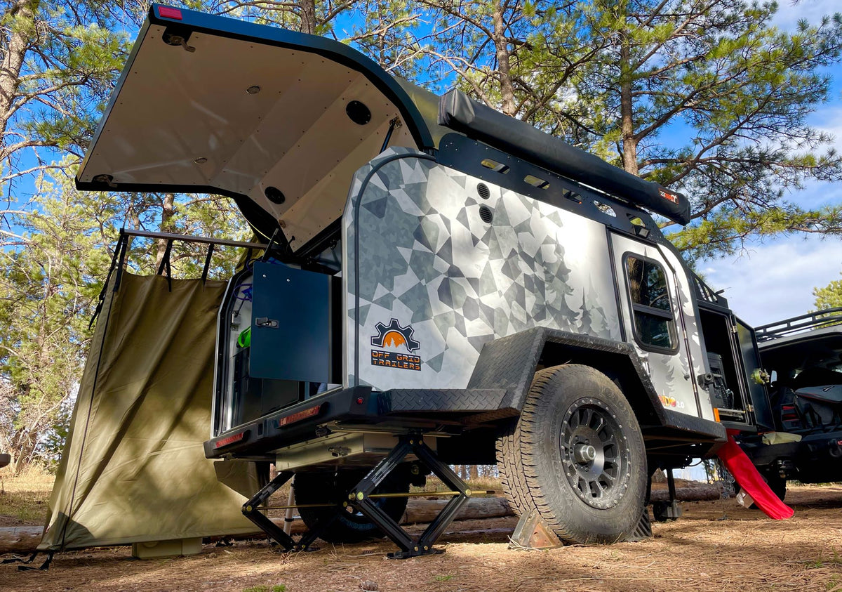 Experience overland adventure with this off-grid teardrop trailer RV rental. Open galley & privacy tent setup.|Off-grid teardrop RV rental