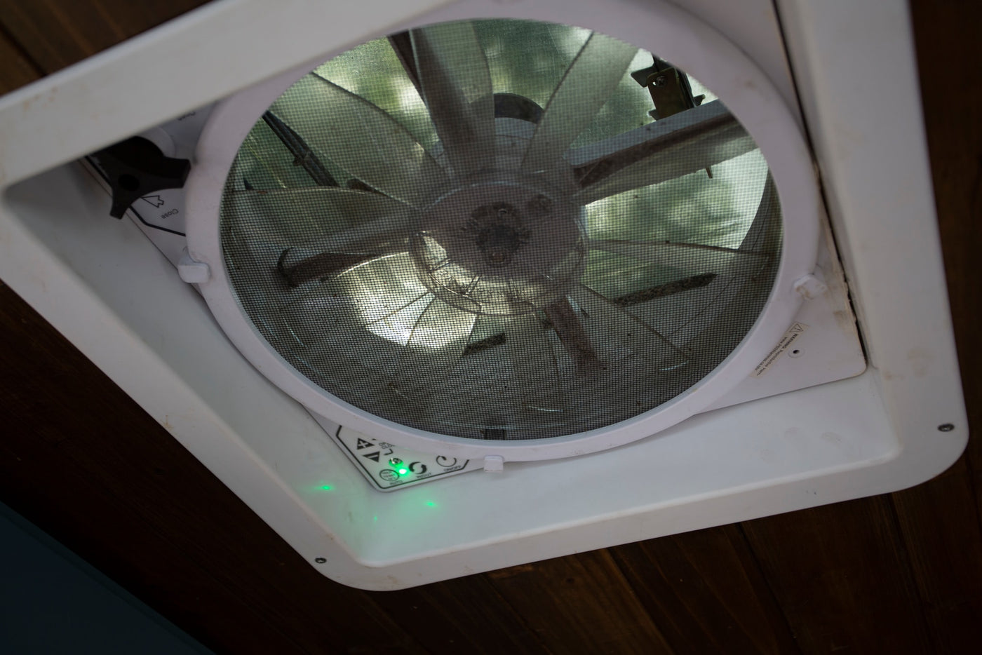 RV rental ceiling fan: White vent with green lights & control panel. Fresh air for your journey. — photo 14