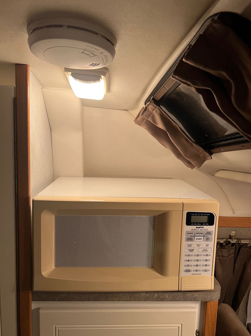  leading to the driver's area.|Rear view of an open Pleasure-Way RV rental — photo 12