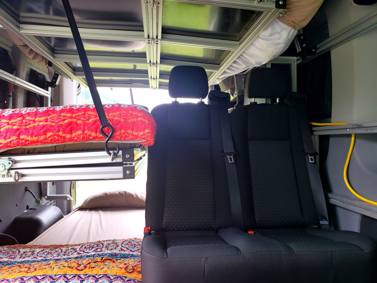  this camper van features stacked bunk beds & modular storage — photo 12