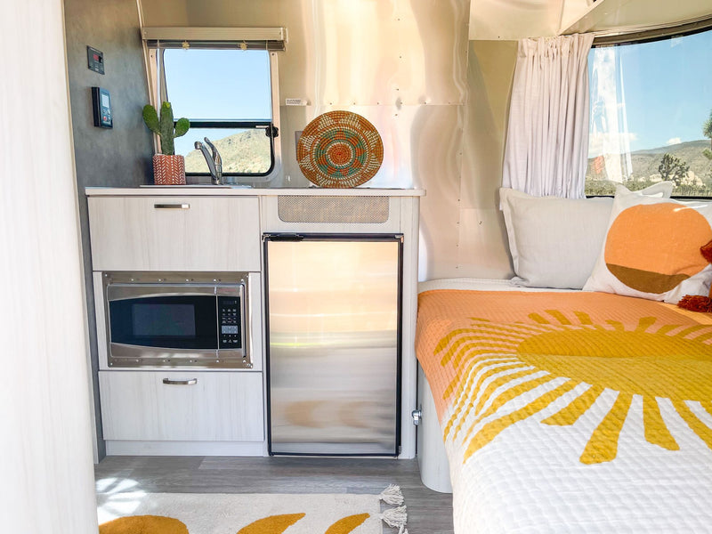 fridge; cozy bed with sun quilt — photo 9