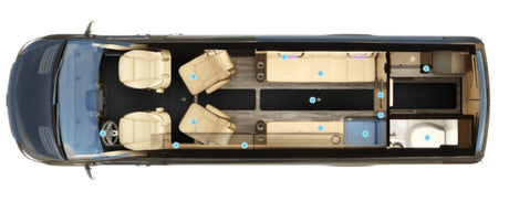 Top-down view of a spacious rv rental interior, featuring plush seating, a well-appointed kitchen, and a private bathroom.
