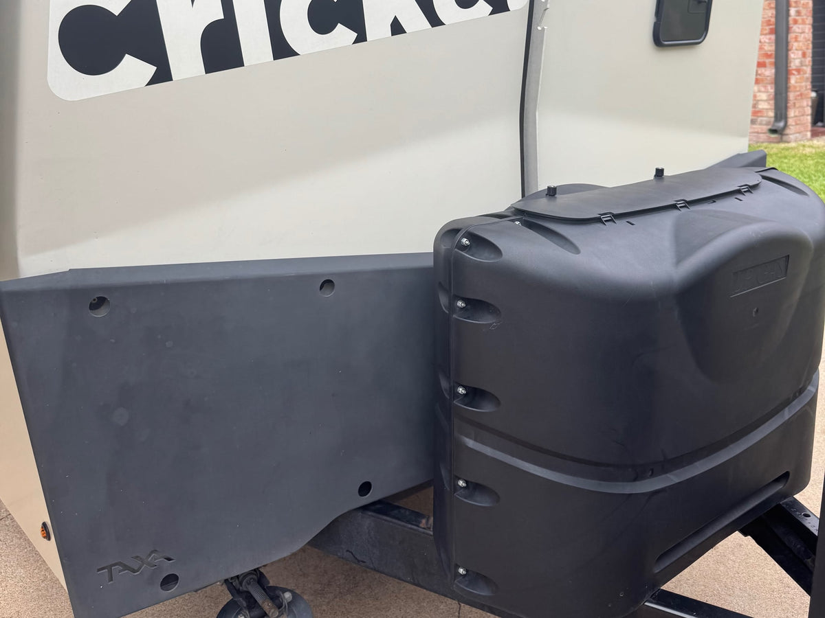  a Dometic portable fridge/freezer keeps items cool for road trips and camping adventures.|Modern RV rental camper kitchen with integrated cooktop — photo 15