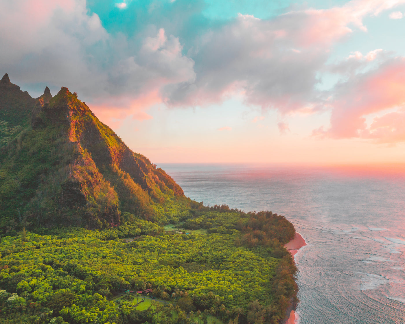 Vibrant sunset over lush mountains and ocean coast. Perfect for exploring with an RV rental. — photo 14