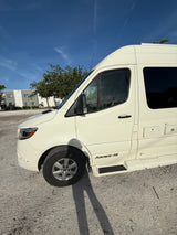 White Ascent-TS camper van, ideal for your next RV rental adventure. This luxurious RV awaits!