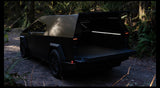 Open camper shell on an electric Tesla Cybertruck in a forest, tailgate down. Great for your next RV rental adventure.