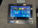 RV rental's smart control panel shows water tank levels, battery status, temperature, and appliance controls.