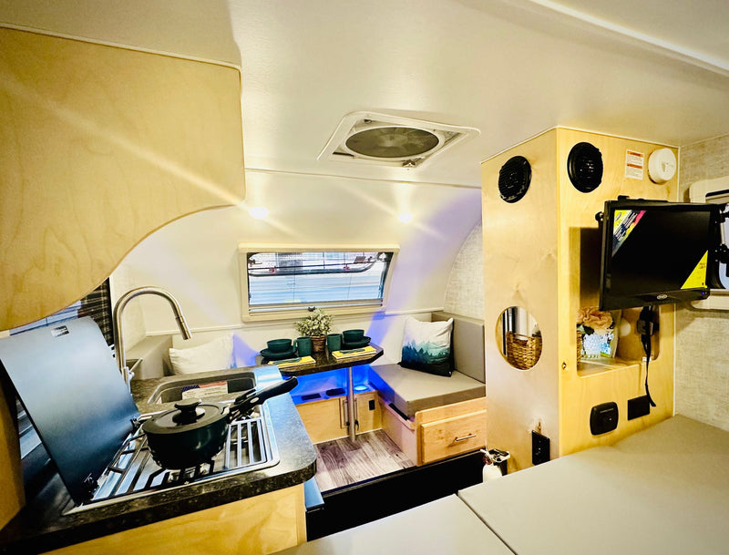  creating a perfect camping oasis.|White BMW X3 SUV tows a Little Guy teardrop camper — photo 7