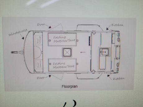 RV rental floorplan shows a compact camper with folding mattress/seats and kitchen layout.