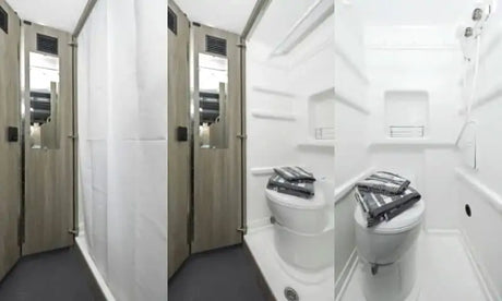 This RV rental features a compact bathroom with a shower, toilet, built-in shelving, and fresh towels.