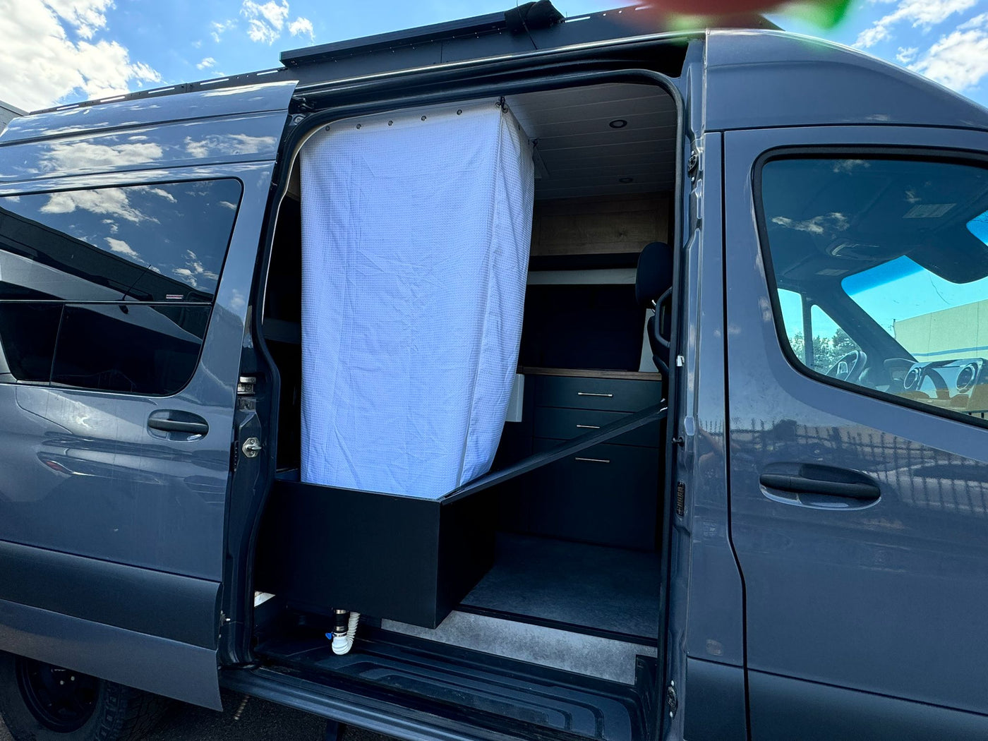  and ample storage.|Modern rv rental camper van interior: cozy bed — photo 4