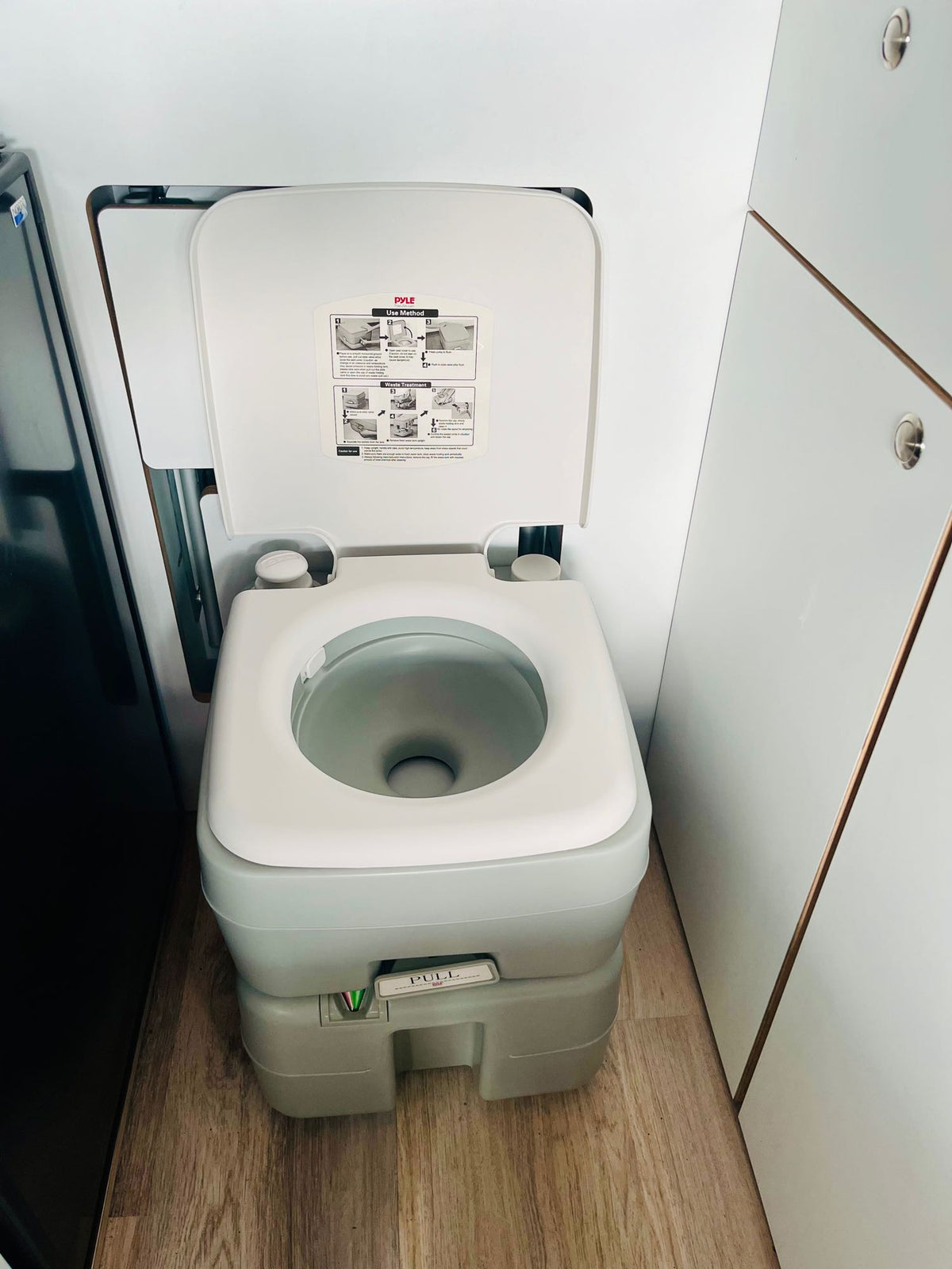  and a functional kitchen. Ideal for adventure travel.|Cozy RV rental interior: quilted bed beside an open window — photo 16