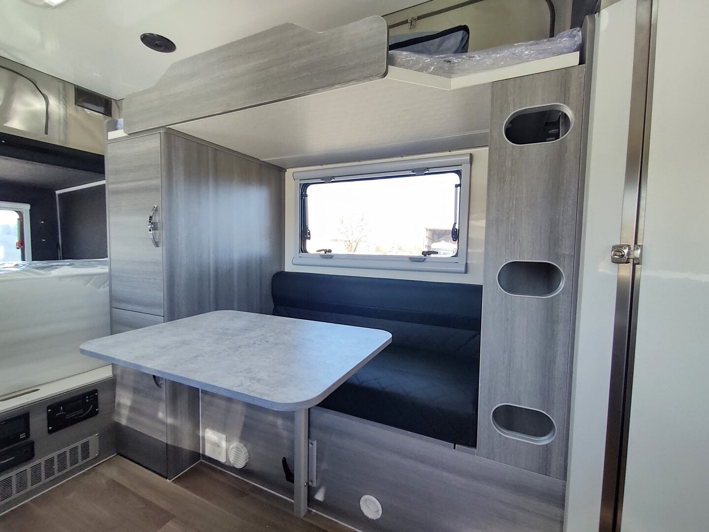  featuring a pop-top and rear spare tires — photo 3