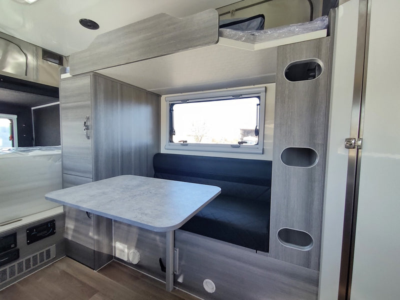  featuring a pop-top and rear spare tires — photo 3